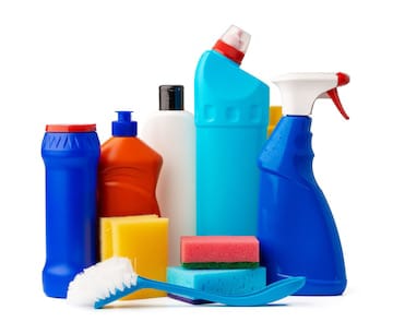 Assortment of colorful cleaning supplies and tools